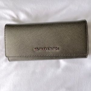 Michael Kors tri fold wallet in shimmery silver with silver hardware
